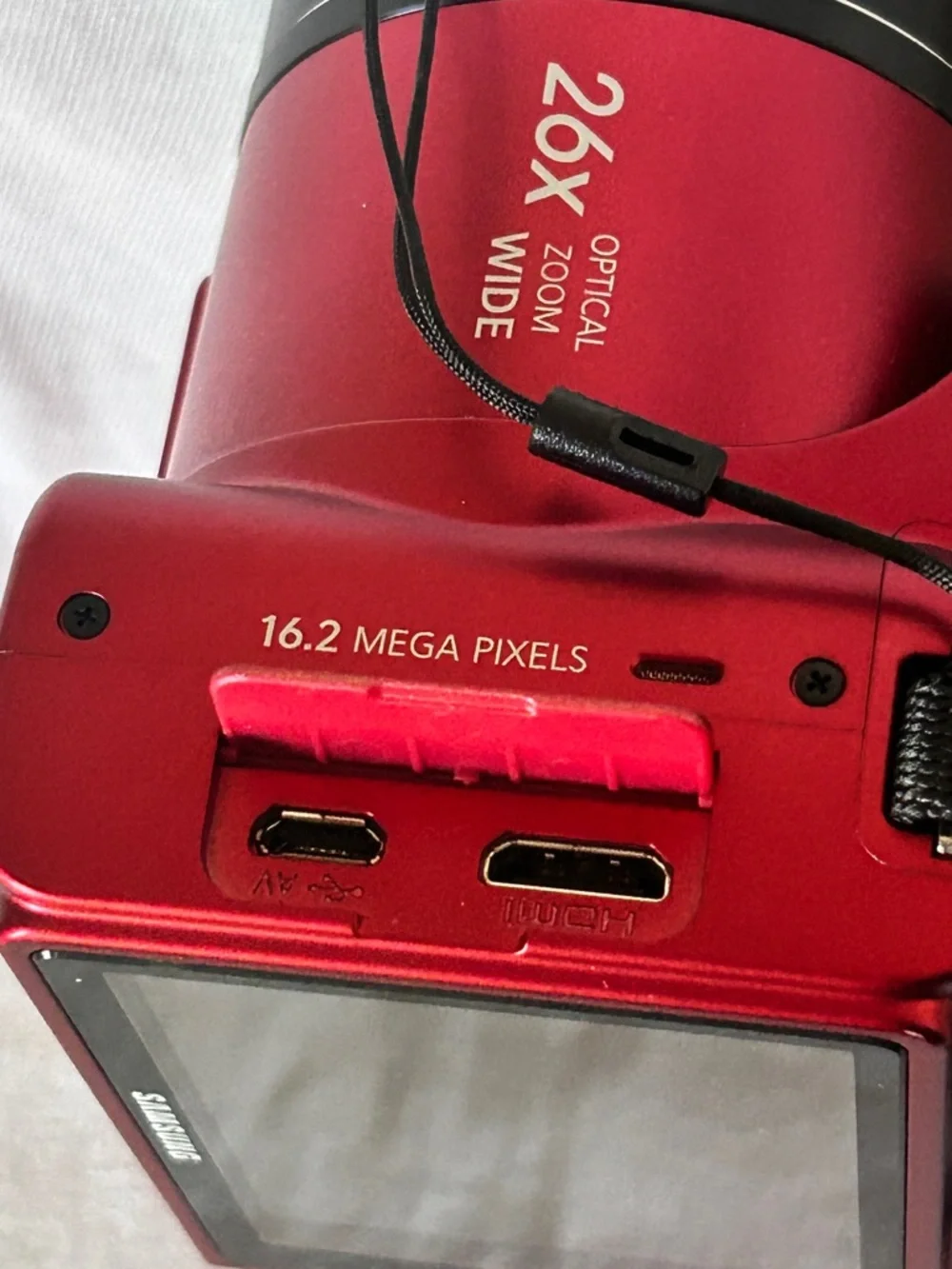 Samsung WB100 Red Digital Camera with Built-in Flash and Strap